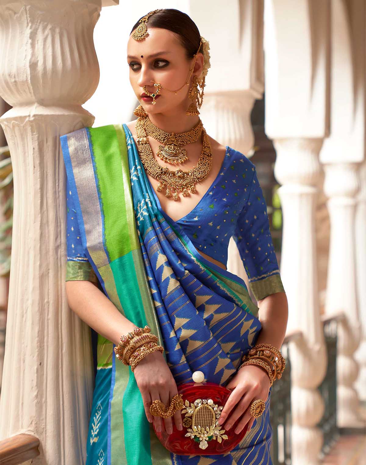 Collection of Teal Blue Patola Silk Woven Design Saree in a gallery layout