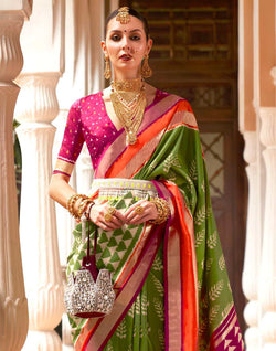 Collection of Stunning Mehendi Green Soft Patola Silk Saree in a gallery layout