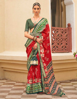 Collection of Red and Green Palkhi Patola Saree in a gallery layout