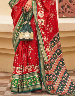 Collection of Red and Green Palkhi Patola Saree in a gallery layout