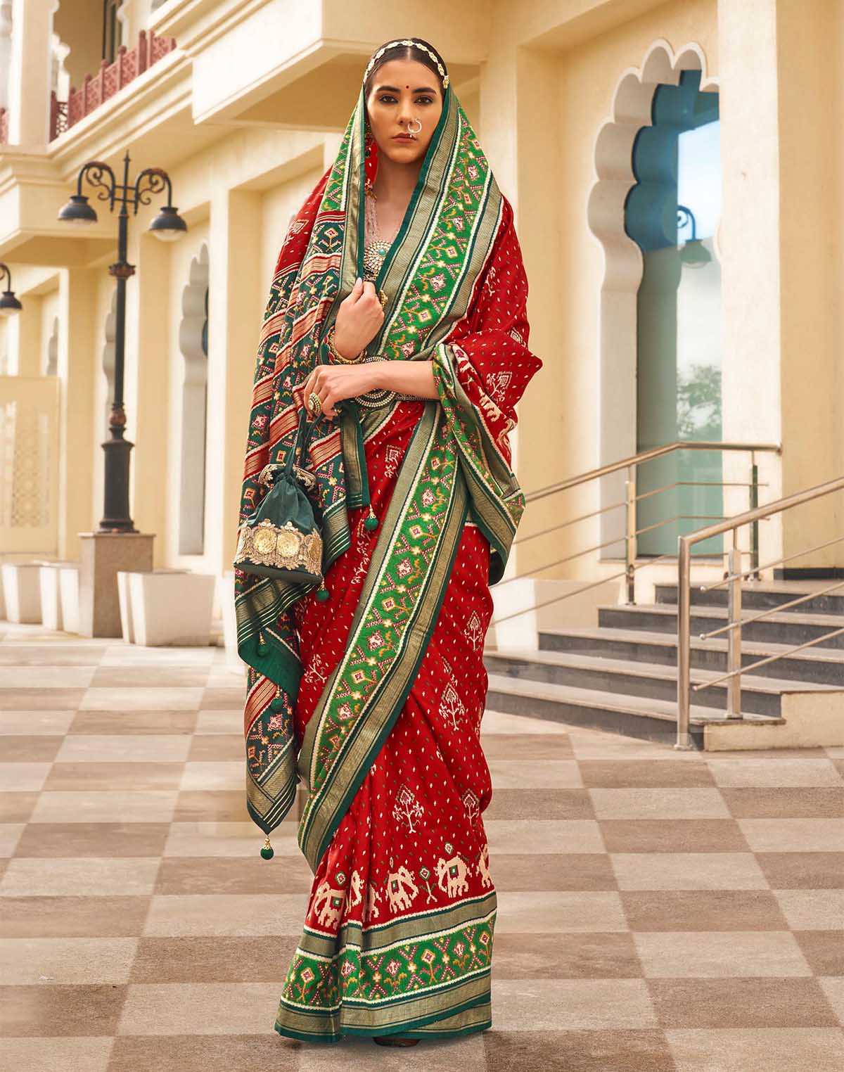 Collection of Red and Green Palkhi Patola Saree in a gallery layout