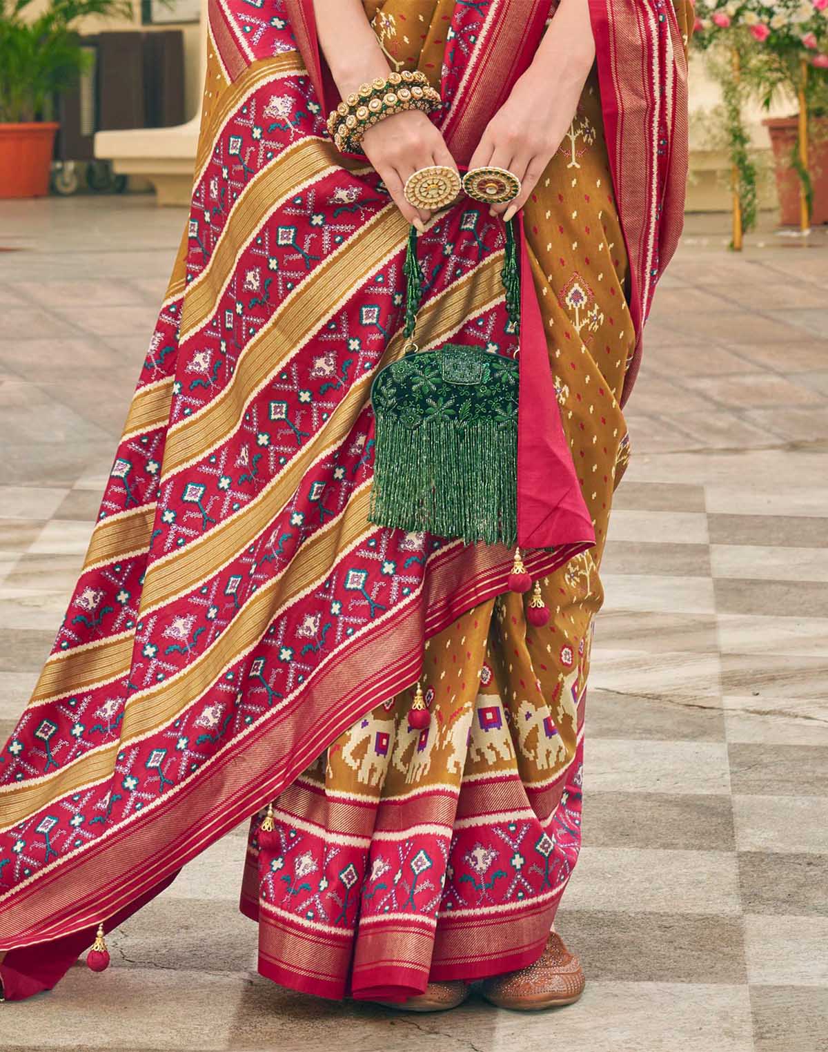 Collection of Light Mustard Palkhi Patola Fancy Saree in a gallery layout