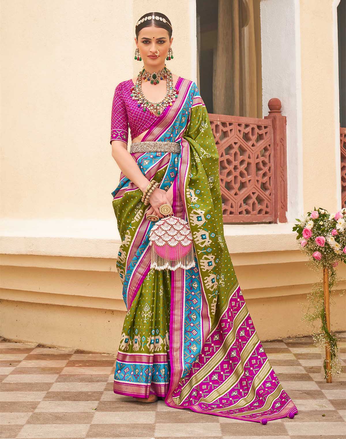 Collection of Elegant Patola Silk Green Saree in a gallery layout