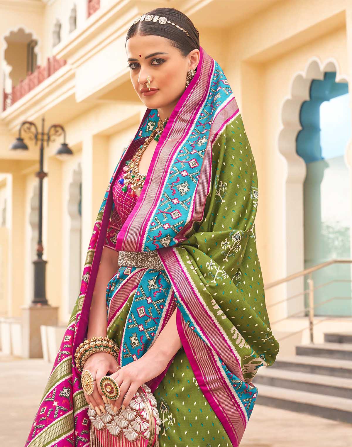 Collection of Elegant Patola Silk Green Saree in a gallery layout