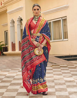 Collection of Navy Blue Palkhi Patola Contrast Border Saree in a gallery layout