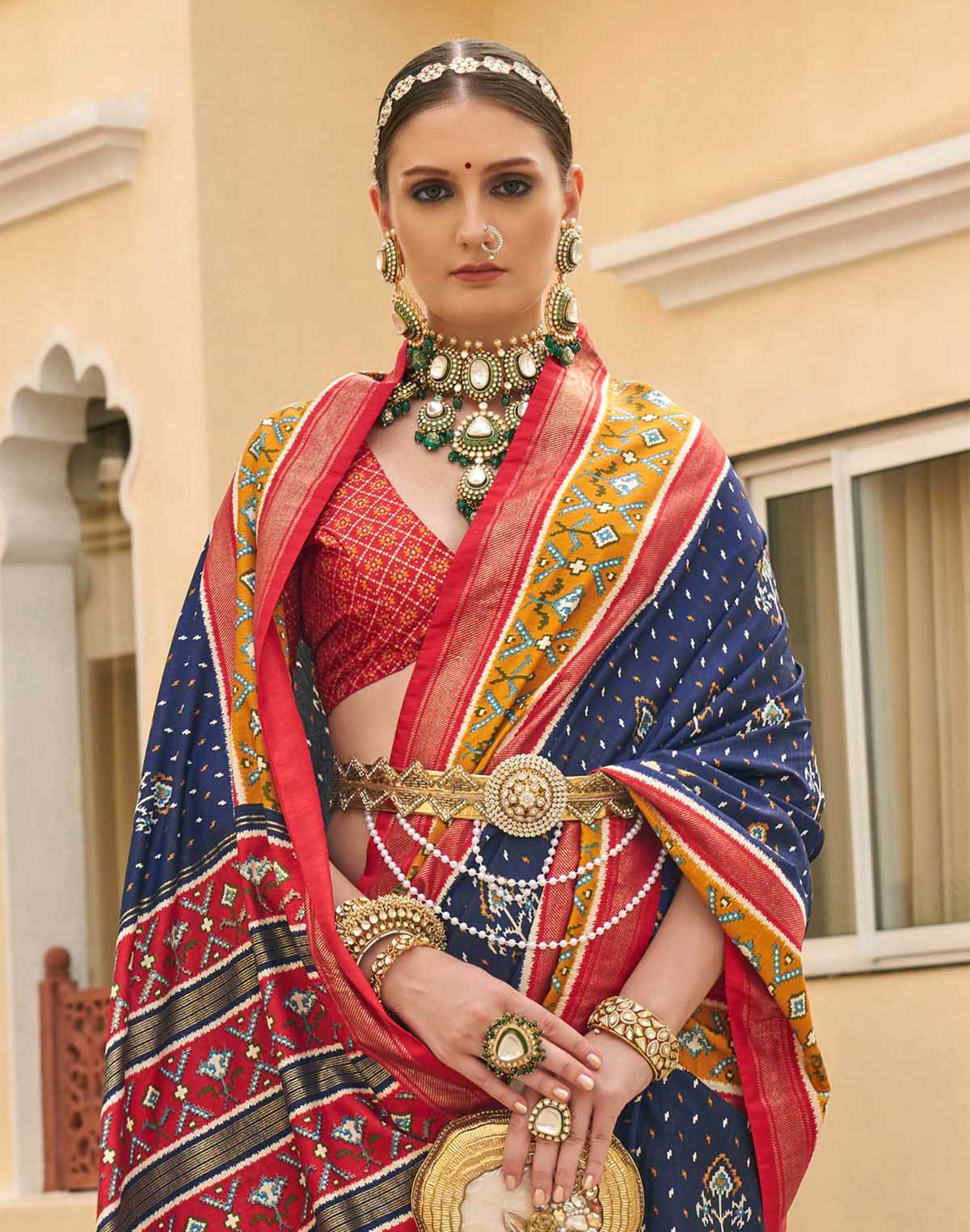 Collection of Navy Blue Palkhi Patola Contrast Border Saree in a gallery layout