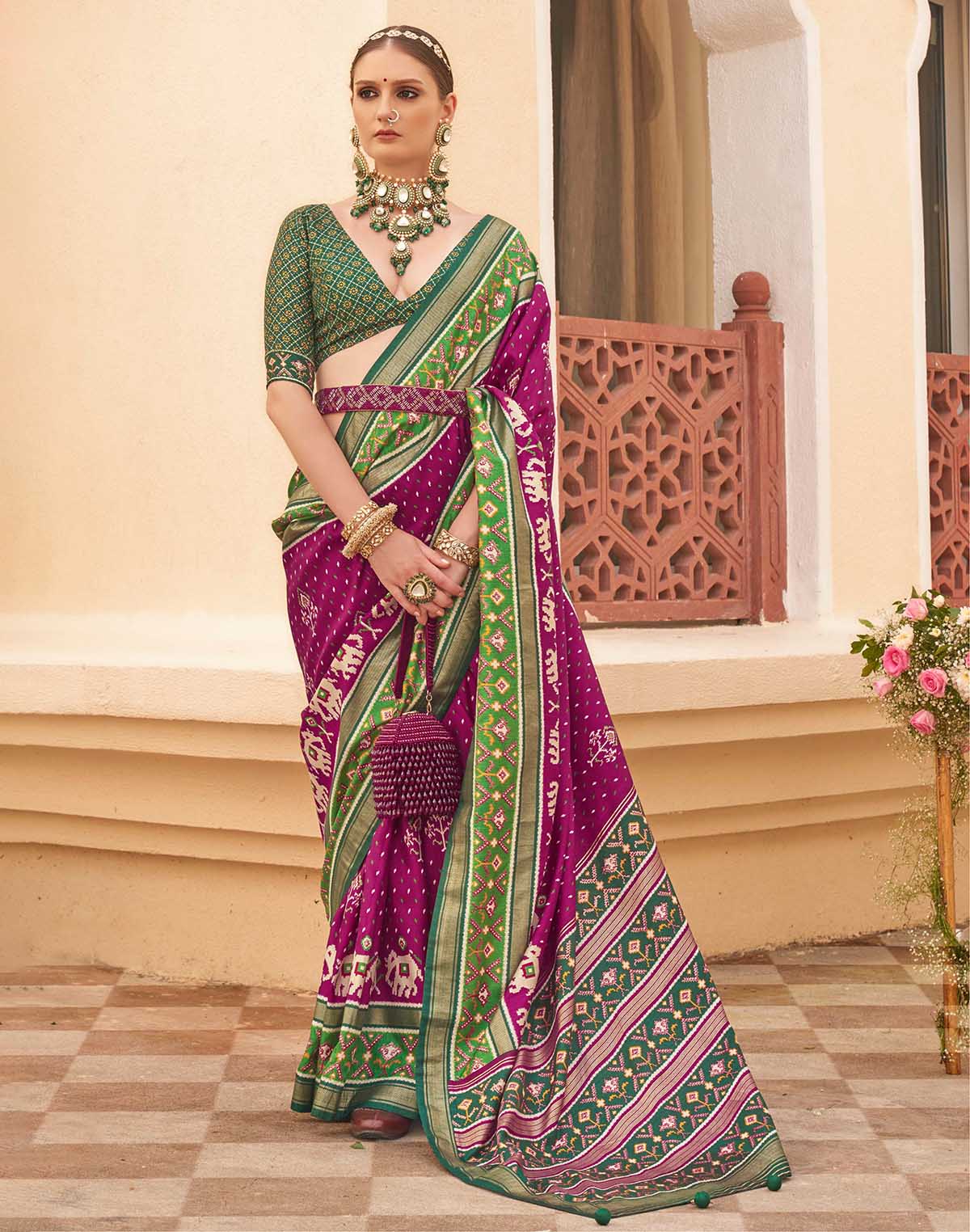 Collection of Wine Colour Patola Saree in a gallery layout