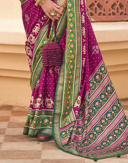 Collection of Wine Colour Patola Saree in a gallery layout