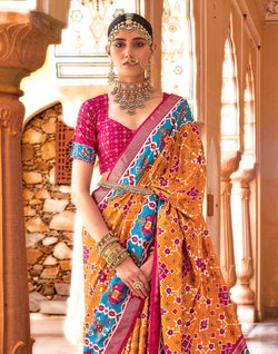 Collection of Mustard and Pink Woven Patola Saree in a gallery layout