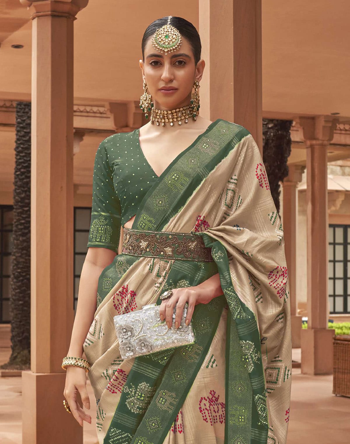 Collection of Beige and Green Woven Motis Patola Silk Saree in a gallery layout