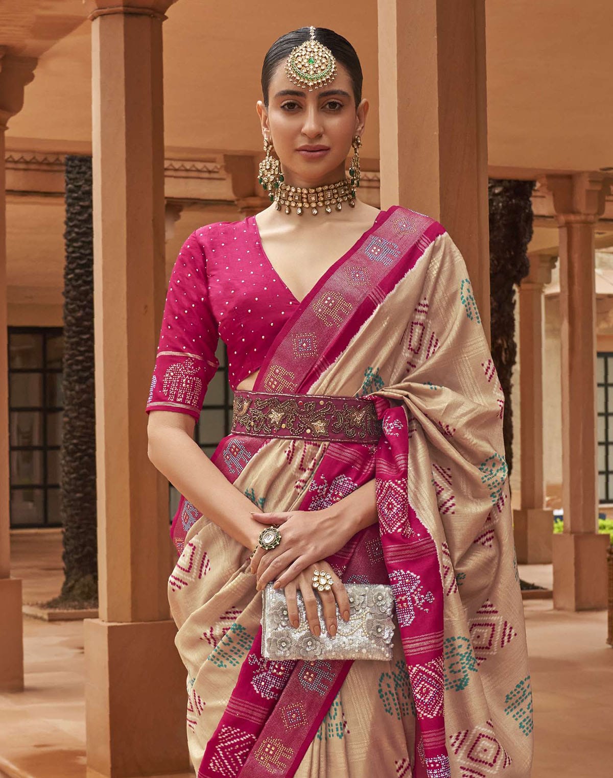 Collection of Beige and Magenta Woven Patola Silk Saree in a gallery layout