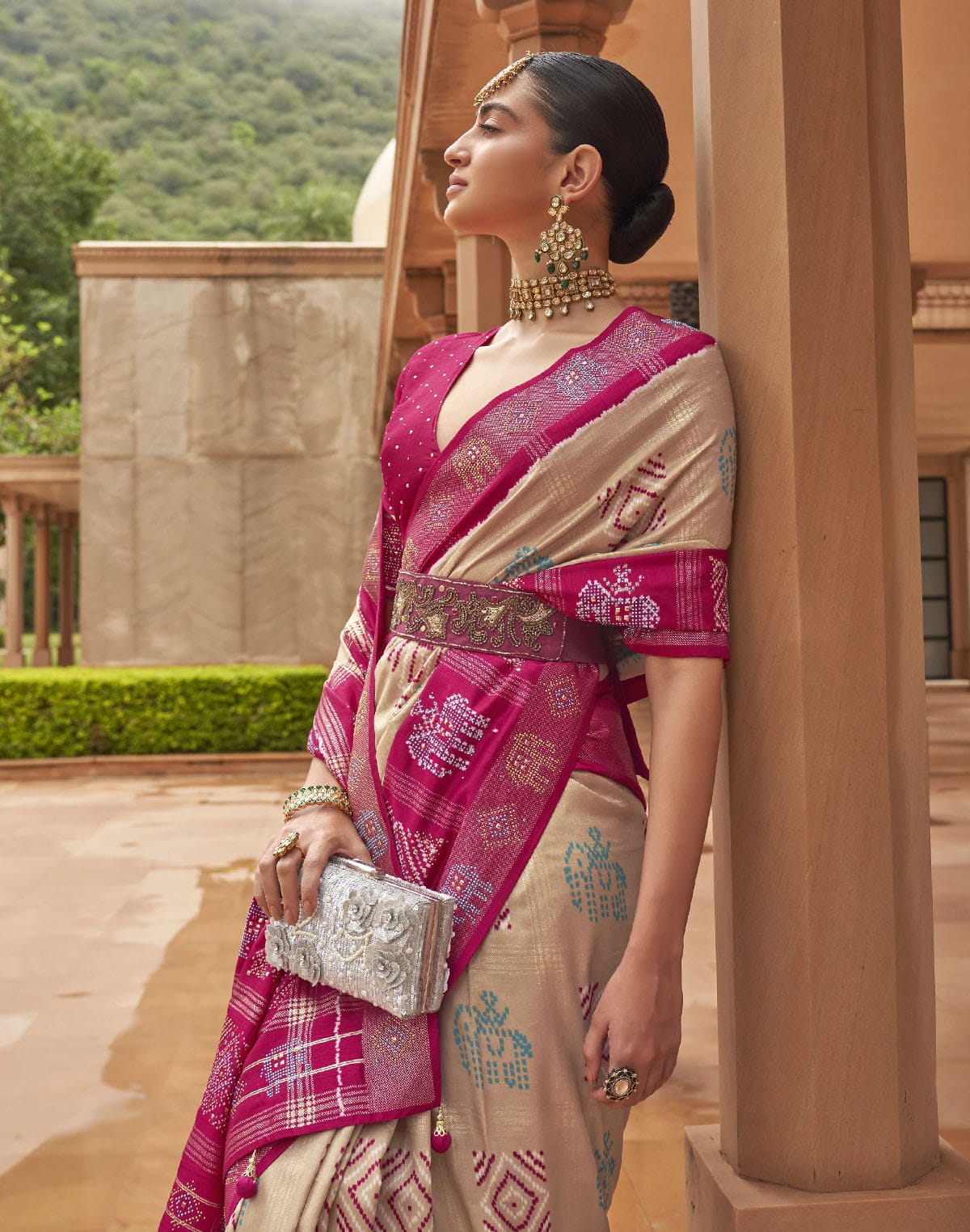 Collection of Beige and Magenta Woven Patola Silk Saree in a gallery layout