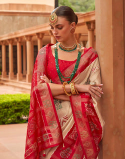 Collection of Cream Coloured Patola Silk Mirror work Saree in a gallery layout