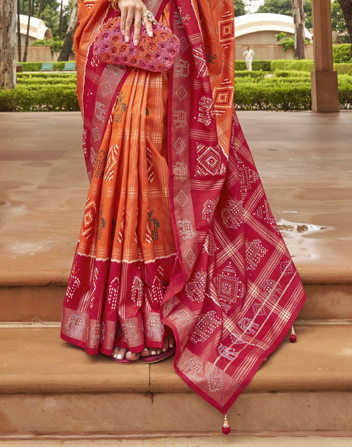 Collection of Orange Patola Silk Contrast Border Saree in a gallery layout