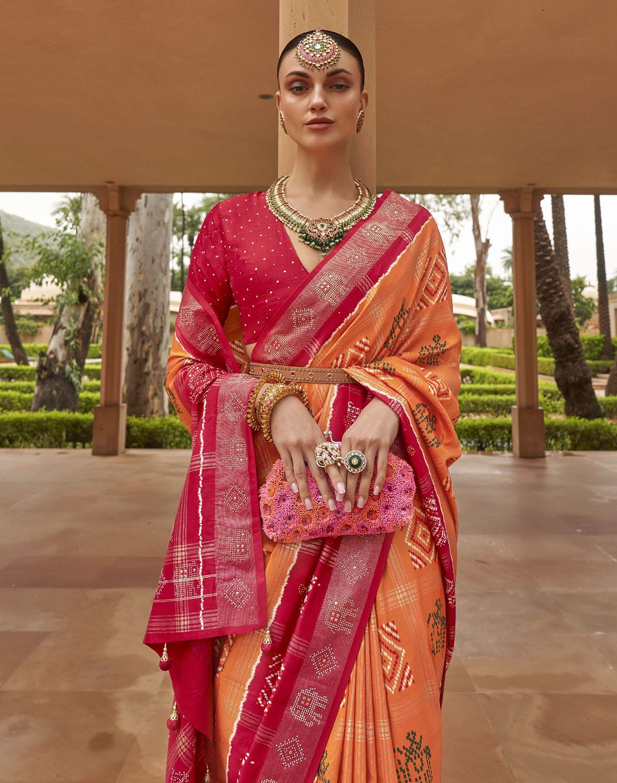 Collection of Orange Patola Silk Contrast Border Saree in a gallery layout