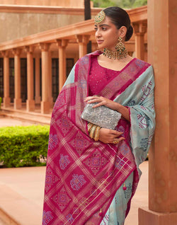 Collection of Attractive Blue Patola Silk Designer Saree in a gallery layout