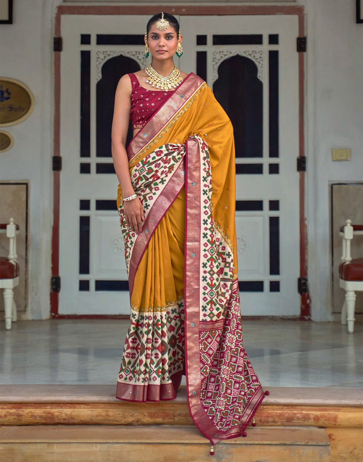 Mustard and Maroon Mirror work Patola Silk Saree