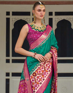 Collection of Sea Green Patola Silk Mirror work Saree in a gallery layout