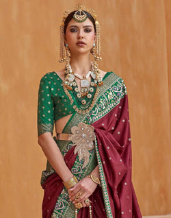 Collection of Maroon Coloured Patola Saree in a gallery layout