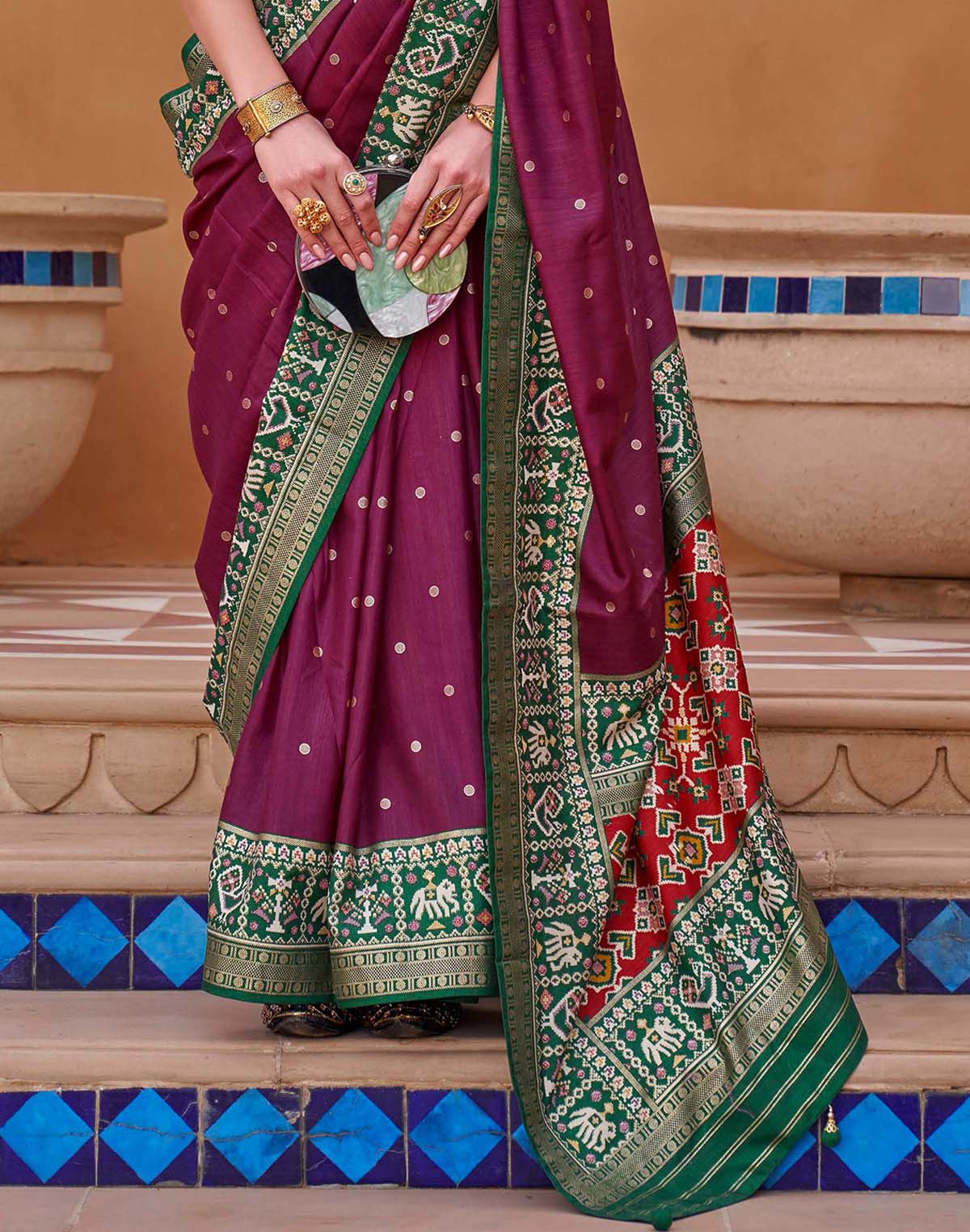 Collection of Classic Brown Patola Designer Silk Saree in a gallery layout