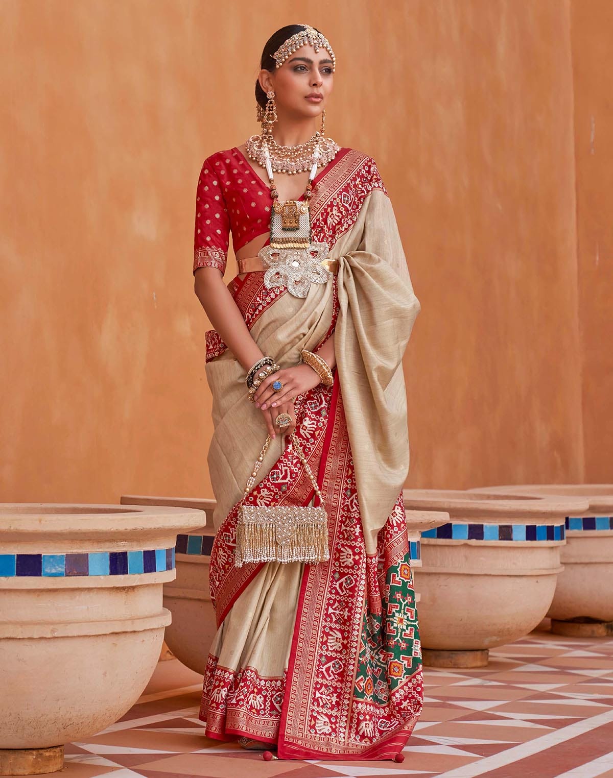 Collection of Patola Silk stylish Beige Color Saree in a gallery layout