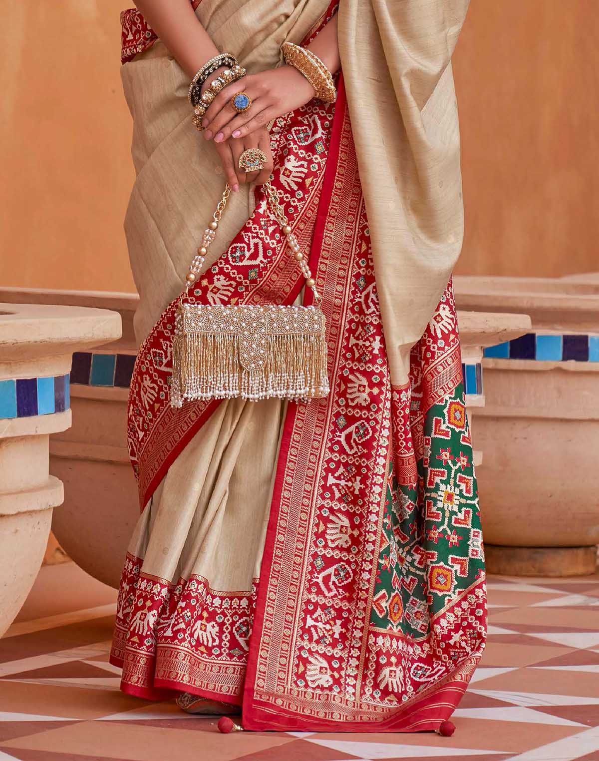 Collection of Patola Silk stylish Beige Color Saree in a gallery layout