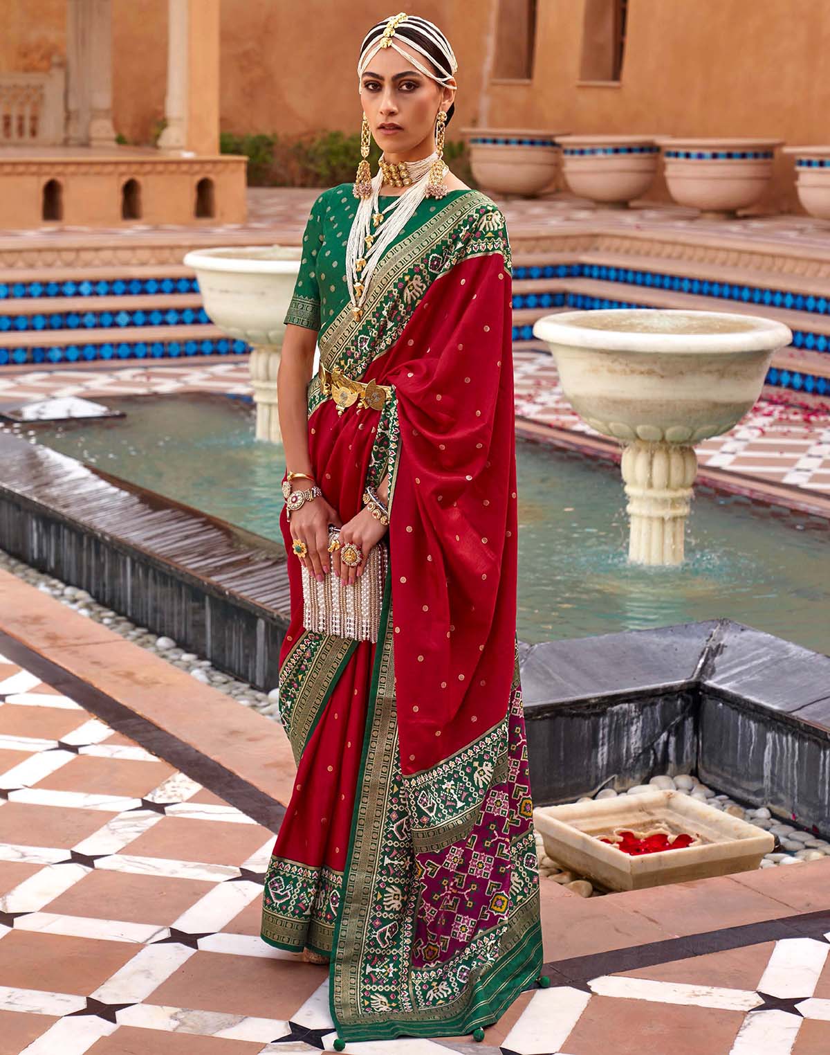 Collection of Red Woven design Patola Silk Saree in a gallery layout