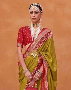 Collection of Ideal Patola Silk Mehendi Green Colour Saree in a gallery layout