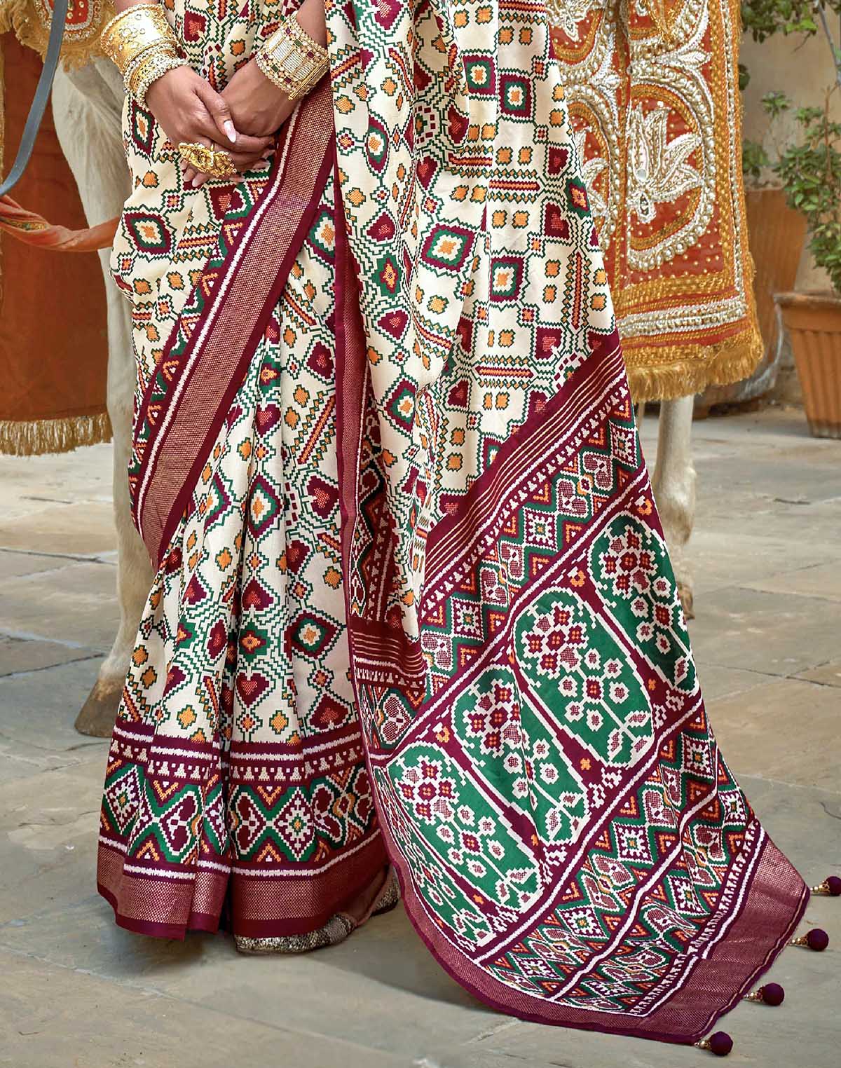 Cream all over Ikat Pattern Trendy Patola Silk Saree