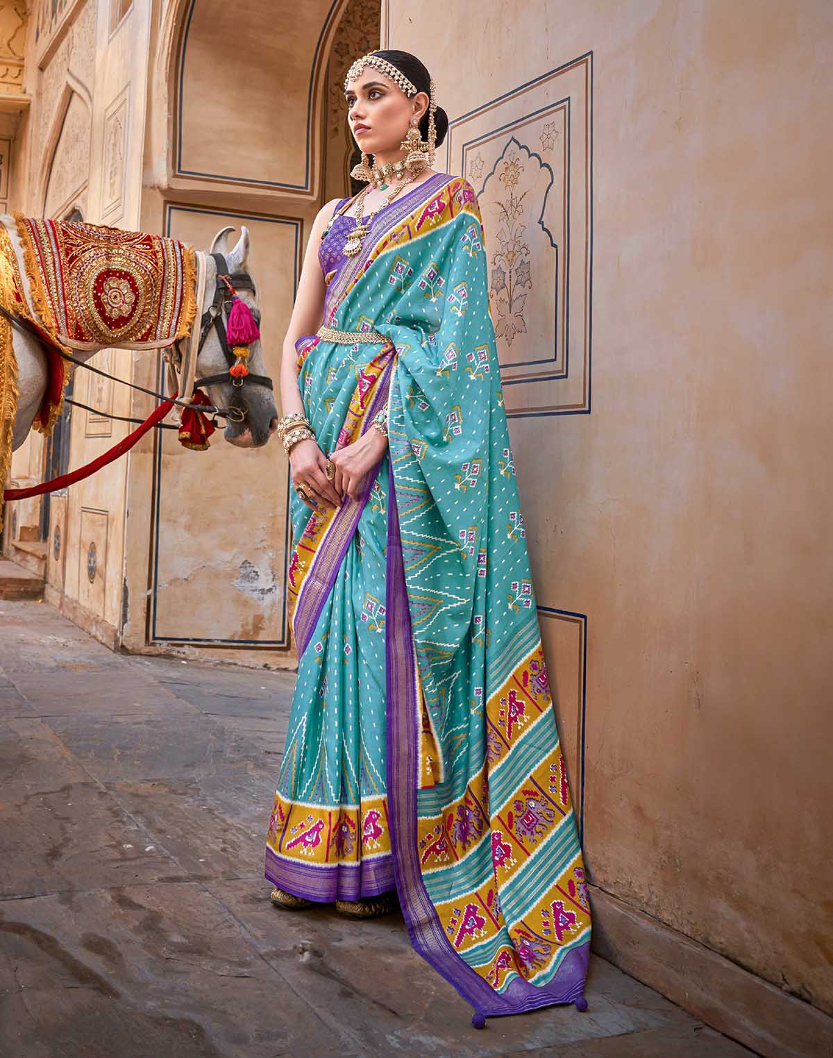 Collection of Patola Silk Saree with Violet Blouse in a gallery layout