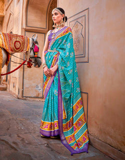 Collection of Patola Silk Saree with Violet Blouse in a gallery layout