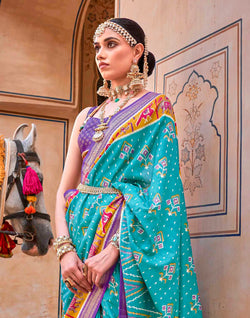 Collection of Patola Silk Saree with Violet Blouse in a gallery layout