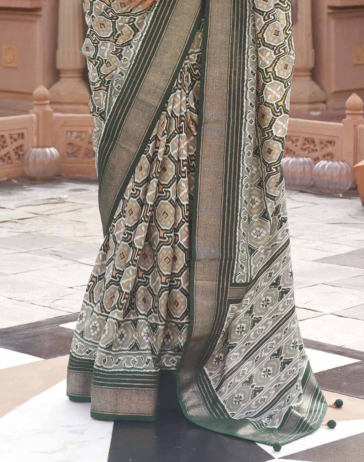 Collection of Dolphin Grey Ikat Print Saree with Contrast Plain Border in a gallery layout