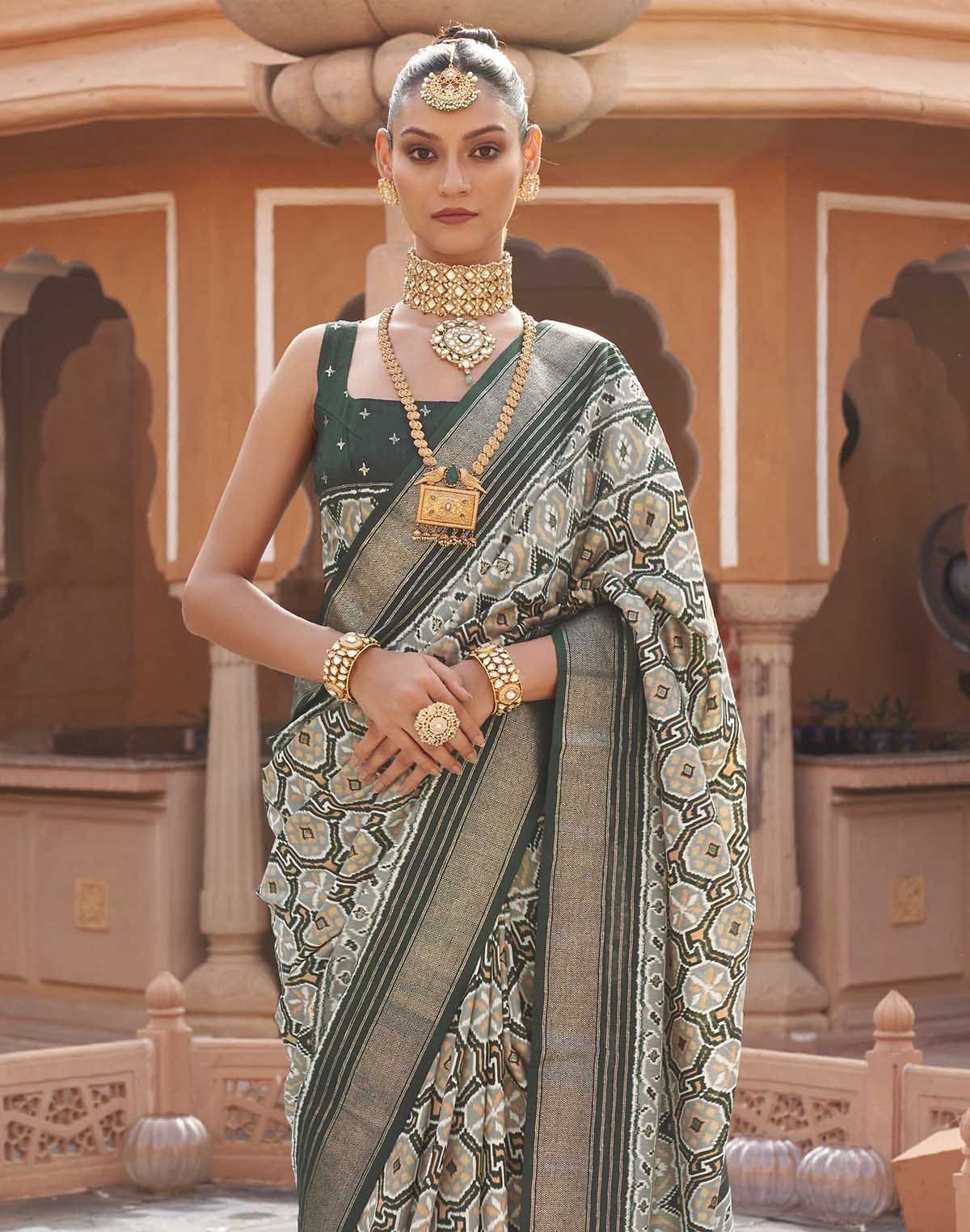 Collection of Dolphin Grey Ikat Print Saree with Contrast Plain Border in a gallery layout