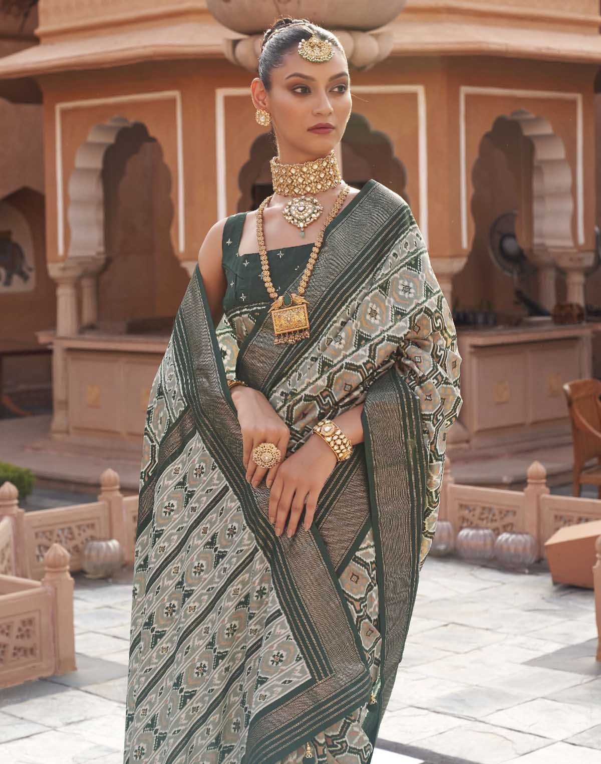 Collection of Dolphin Grey Ikat Print Saree with Contrast Plain Border in a gallery layout