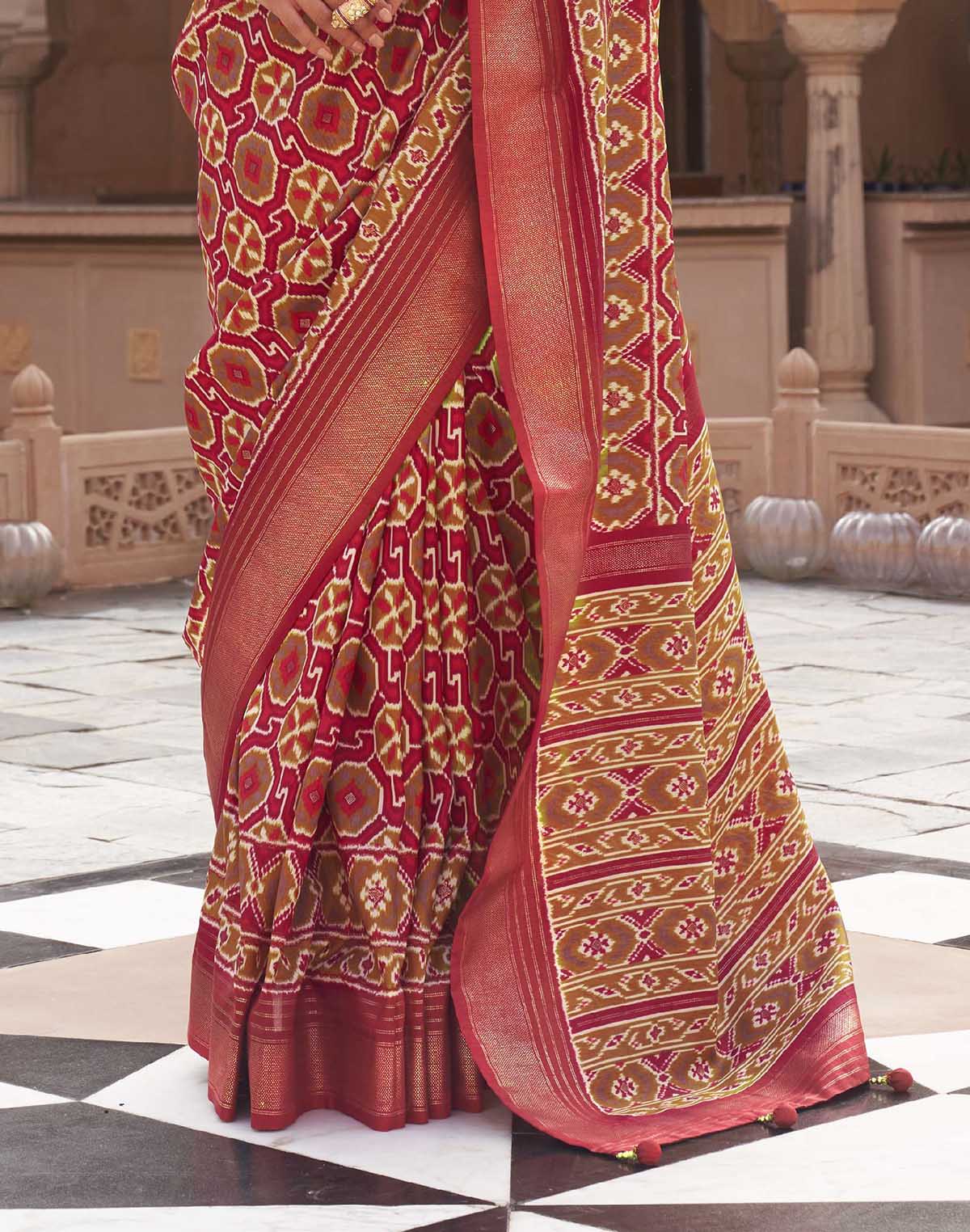 Collection of Red Pochampally Silk Patola Fancy Saree in a gallery layout