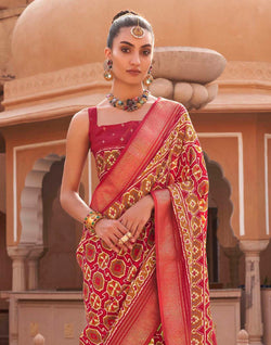 Collection of Red Pochampally Silk Patola Fancy Saree in a gallery layout