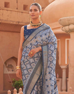 Collection of Light Blue Ikat Pattern Pochampally Patola Silk Saree in a gallery layout