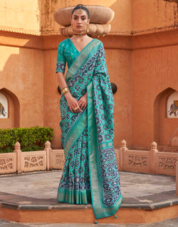 Collection of Light Green Ikat Patola Silk Saree in a gallery layout