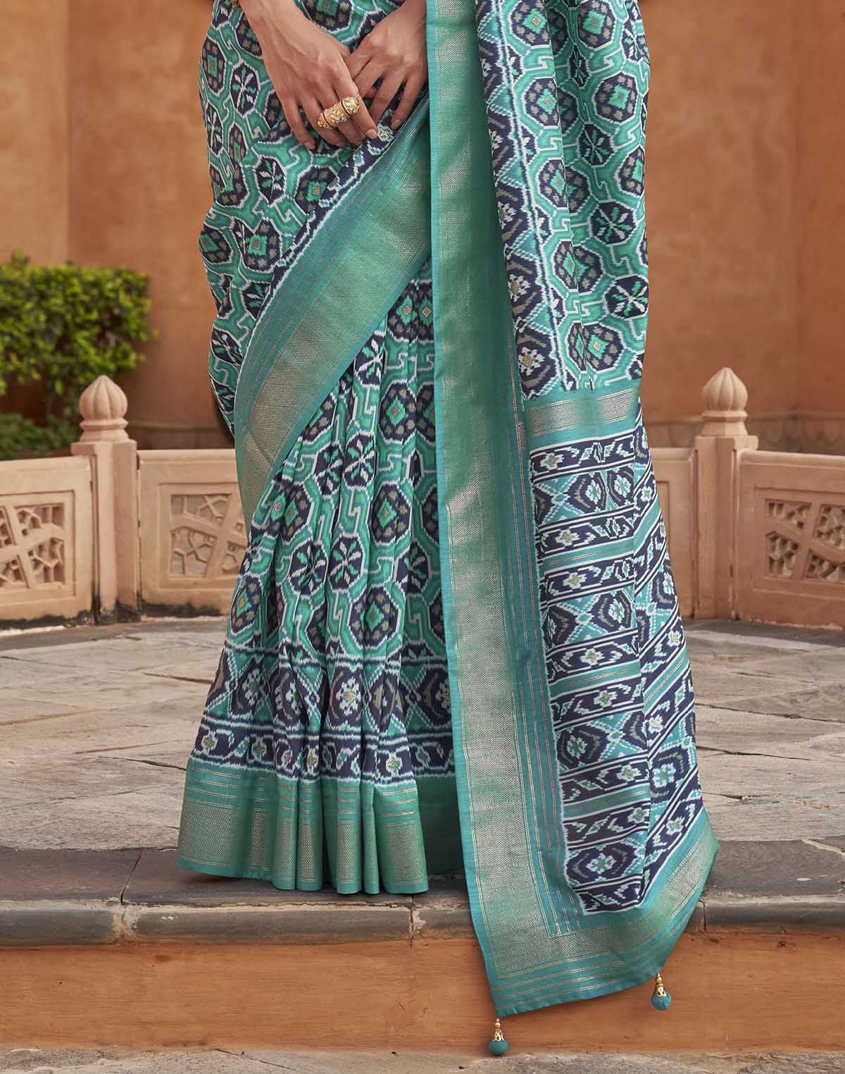 Collection of Light Green Ikat Patola Silk Saree in a gallery layout