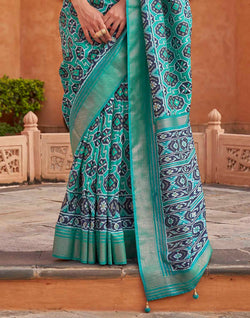 Collection of Light Green Ikat Patola Silk Saree in a gallery layout