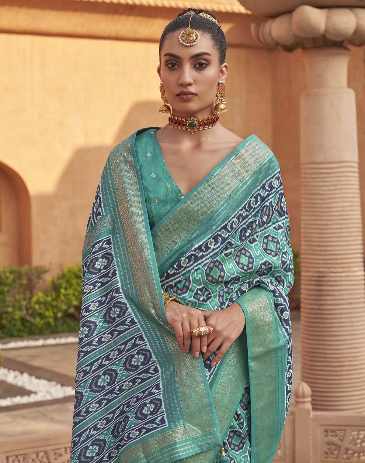 Collection of Light Green Ikat Patola Silk Saree in a gallery layout