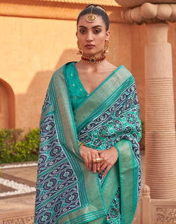 Collection of Light Green Ikat Patola Silk Saree in a gallery layout