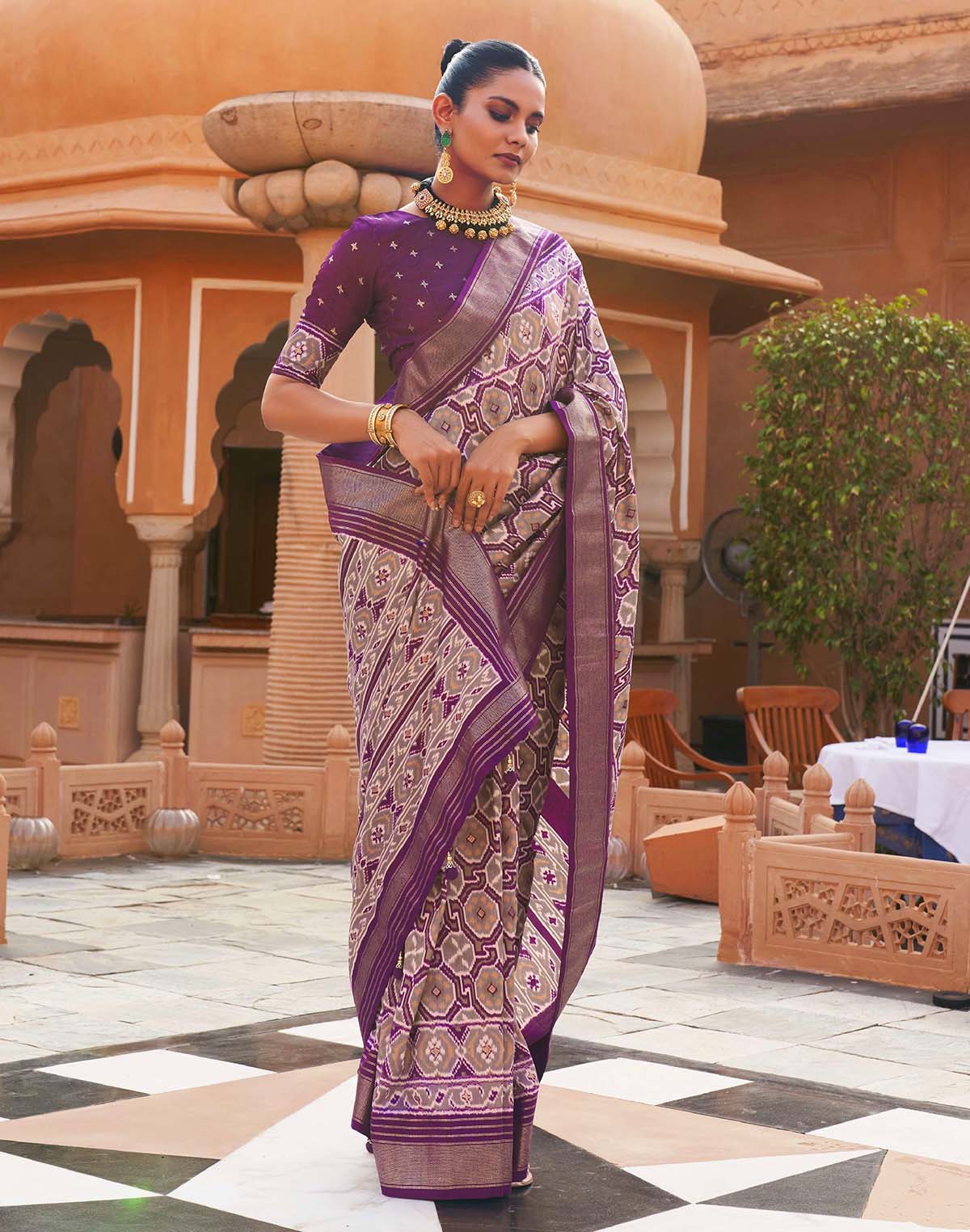 Collection of Purple Ikat Pochampally Designer Saree in a gallery layout