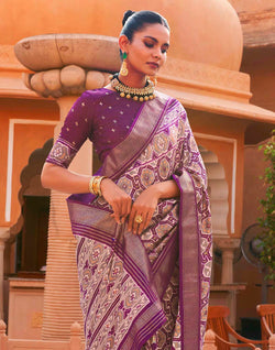 Collection of Purple Ikat Pochampally Designer Saree in a gallery layout