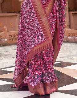 Collection of Magenta Patola Silk Woven Saree in a gallery layout