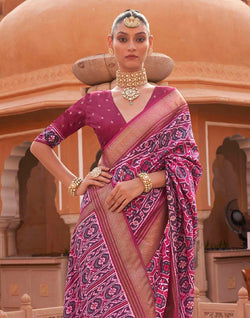 Collection of Magenta Patola Silk Woven Saree in a gallery layout