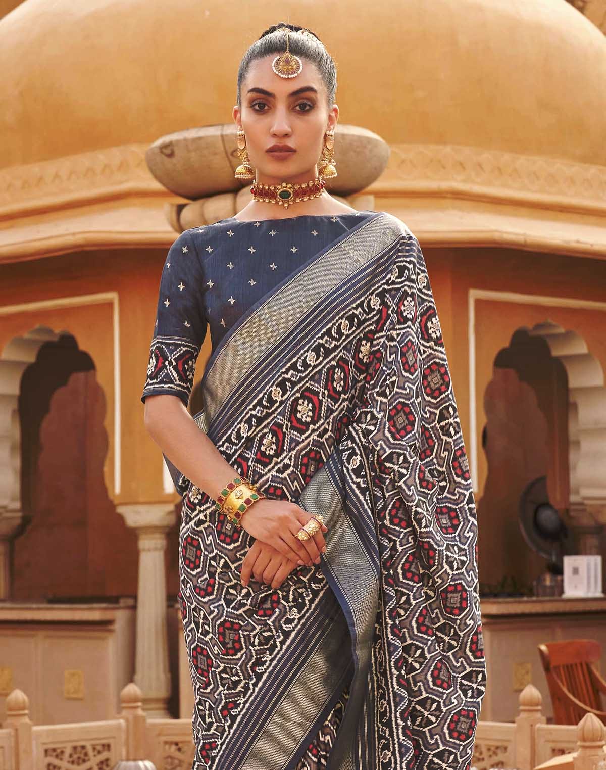 Collection of Dark Grey Patola Silk Saree in a gallery layout