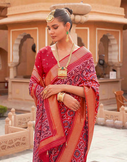 Collection of Red Ikat Print Patola Saree with Contrast Zari Border in a gallery layout