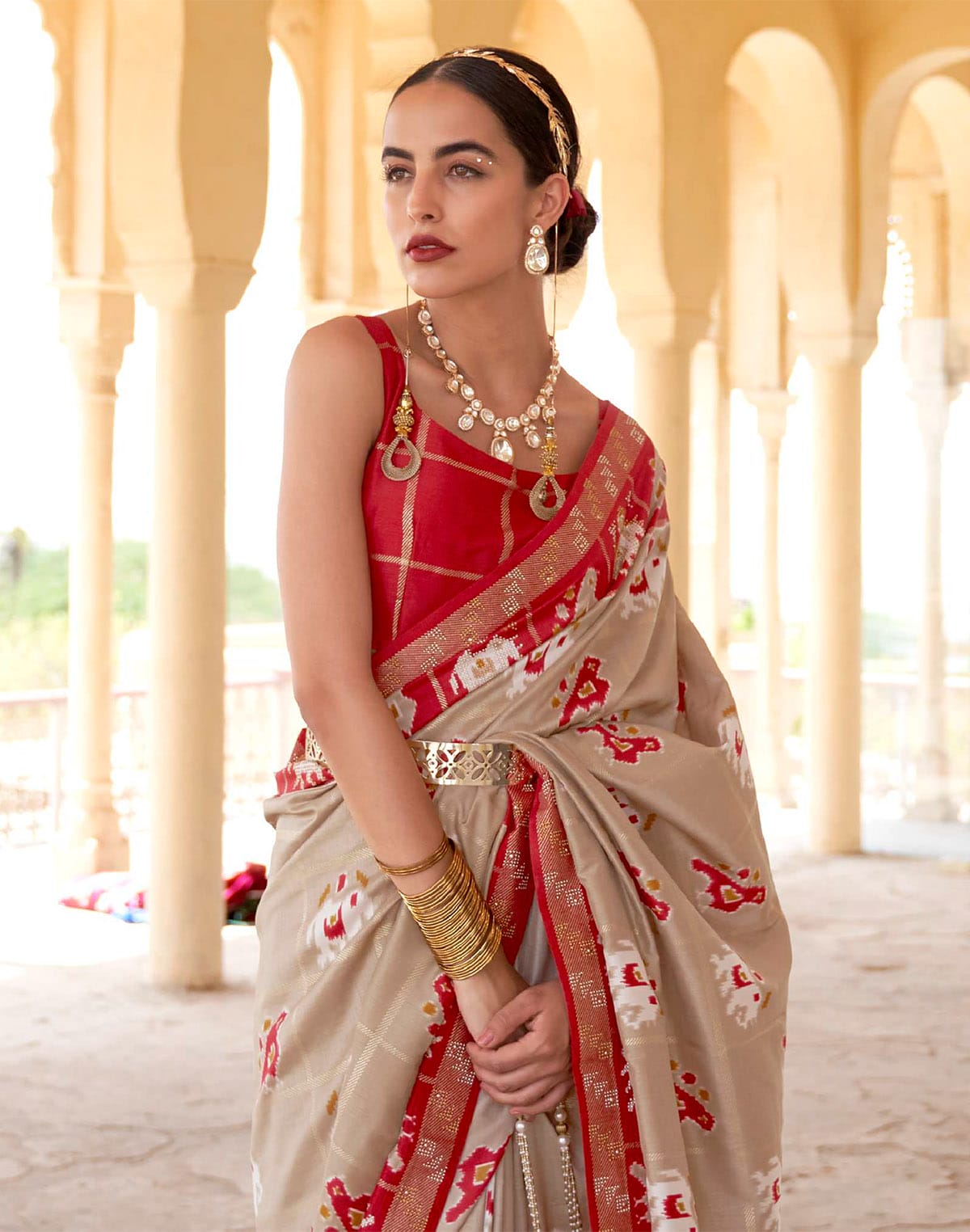 Elegant Beige Woven Design Patola Saree